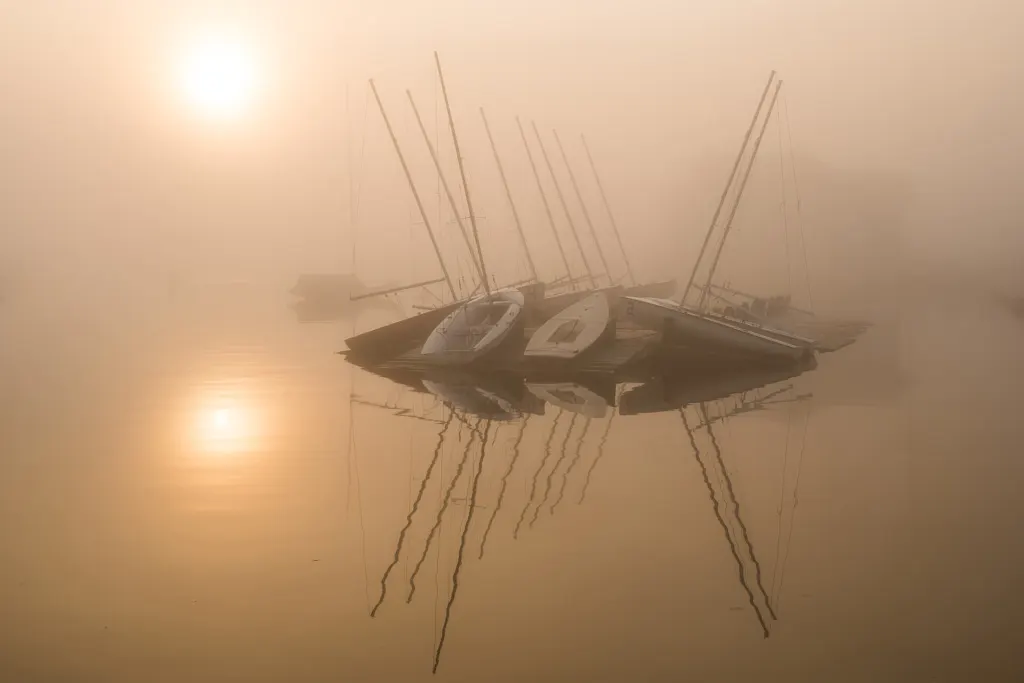 Fog over Watch Hill Cove at sunrise