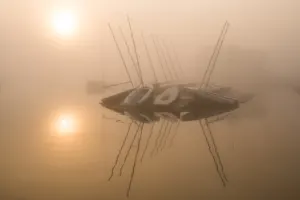 Fog over Watch Hill Cove at sunrise