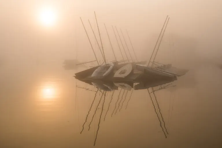 Fog over Watch Hill Cove at sunrise